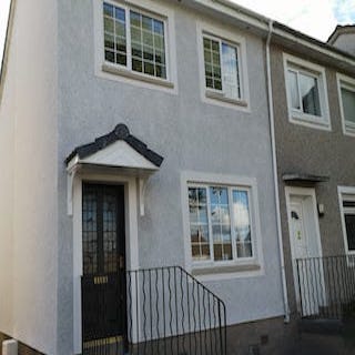 Rear Semi detached house in white chip roughcast