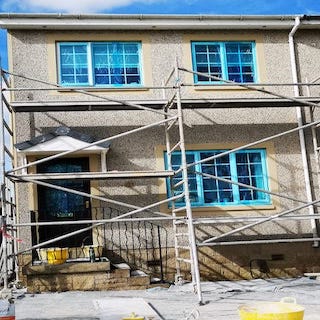 Semi detached house in white chip roughcast